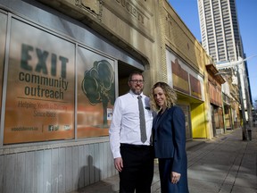 Adam Flegel, program supervisor, left and Dr. April Elliott, founder of the clinic, at the 10 year anniversary of Calgary Adolescent Treatment Services which works in conjunction with Woods Homes and Exit Outreach to help vulnerable youth deal with health issues and drug addiction in Calgary, Alta., on Tuesday February 28, 2017. Leah Hennel/Postmedia