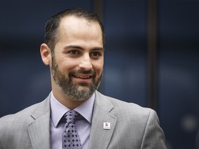 Dan Rowland of the City of Denver's Office of Marijuana Policy and Department of Excise and Licenses smiles while chatting at City Hall in Calgary, Alta., on Monday, Feb. 6, 2017. Council took part in a marijuana education session as a way to prepare for the day cannabis is legalized in Canada. Lyle Aspinall/Postmedia Network