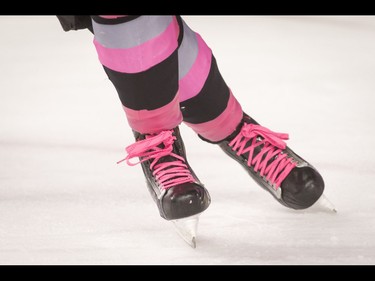 Pink laces and socks hit the ice during the first-ever BE BRAVE Anti-Bullying Game, a regular-season WHL tilt between the Calgary Hitmen and Brandon Wheat Kings, in Calgary, Alta., on Wednesday, Feb. 22, 2017. More than 8,000 students from Calgary and area were bussed to the morning game as part of Pink Shirt Day, enjoying concourse activities and special entertainment in addition to the regular-season game. Lyle Aspinall/Postmedia Network