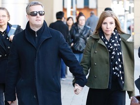 Rod and Jennifer O'Brien, the parents of Nathan OíBrien, are pictured leaving the Calgary Courts Centre following the sentencing of Douglas Garland on Friday, Feb. 17, 2017. Their son Nathan O'Brien was murdered by Garland in 2014, along with his grandparents. Garland was sentenced to life in prison without parole for a minimum of 75 years for the murders. AL CHAREST/POSTMEDIA