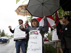 AUPE members picket outside the Hardisty Nursing Home in 2012. The AUPE will have 74 contracts expire in 2017.