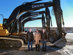 Keystone Excavating CEO Sandip Lalli and the sons of company founder Ed Elias,  Jim, left and Ken were photographed with some of the company's excavators on Thursday February 12, 2017. After 35 years in Alberta the company is shutting down amidst the continuing economic downturn. GAVIN YOUNG/POSTMEDIA