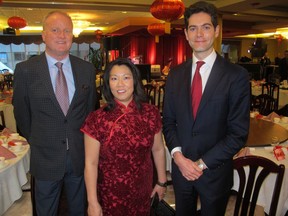 Cal 0304 Chinese 4 Joining Alexandria Sham, HKCBA national chair at  the annual Hong Kong Canada Business Association (HKCBA) Calgary Section Chinese New Year Gala held at the Regency Palace Restaurant are Cathay Pacific' Ross Cronin (left) , director, marketing and sales and Nick Hays, Cathay Pacific, vice-president, Canada. Cathay Pacific is a major supporter of the HKCBA.