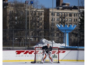 Calgary Flames goaltender Chad Johnson practices on a rink in New York's Central Park Saturday, Feb. 4, 2017. (Craig Ruttle/ AP Photo)