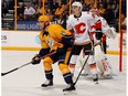 Michael Stone of the Calgary Flames defends against Calle Jarnkrok of the Nashville Predators at Bridgestone Arena on Feb. 21, 2017, in Nashville, TN. (Getty Images)