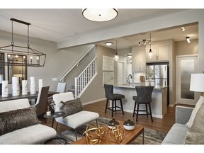The open-concept main level for the Colorado show home by Calbridge Homes in Fireside.