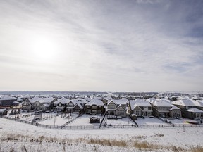 New homes stand in Cranston's Riverstone area of Calgary, Alta., on Wednesday, Feb. 8, 2017.