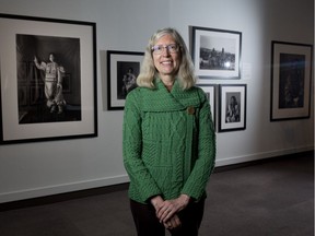 Curator Susan Kooyman with the new exhibit North of Ordinary, photographs of Geraldine and Douglas Moodie at the Glenbow Museum in Calgary, Alta., on Wednesday February 15, 2017. Leah Hennel/Postmedia