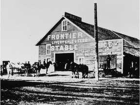 The Frontier stables built in 1883 once occupied land around 7th Avenue and 2th Street S.W.