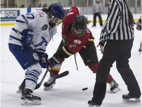 Calgary Inferno's Sarah Davis faces off against Toronto Furies' Emily Fulton at Winsport in Calgary, on Jan. 17, 2016. (File)