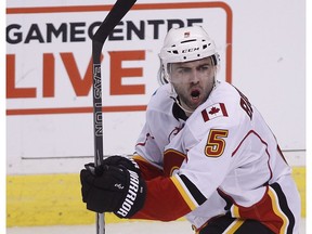 Calgary Flames defenceman Mark Giordano celebrates his goal against the Vancouver Canucks on Saturday, February 18, 2017. (The Canadian Press)