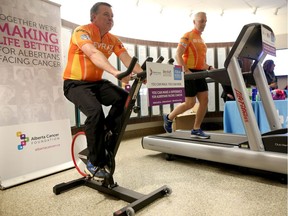 Mike Reid, left and Joel Guay take part in an event at the Tom Baker Cancer Centre in Calgary, on Feb. 3, 2017, in support of World Cancer Day.