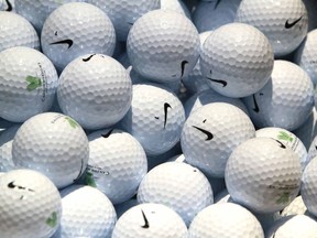 Nike brand golf balls are shown in a bucket during the Celebrity Shoot Out closest to the hole competition on Wednesday July 16, 2014 in Calgary, Alta at Canyon Meadows Golf Club. The fun competition was in advance of the Shaw Celebrity Classic Golf tournament which runs August 27-31, 2014.  Jim Wells/Calgary Sun/QMI Agency