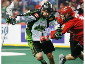 The Calgary Roughnecks' Curtis Manning tangles with the Saskatchewan Rush's Jeremy Thompson during National Lacrosse League action at the Scotiabank Saddledome in Calgary on Saturday February 4, 2017. The Roughnecks travel to Saskatoon to take on the Rush on Saturday.