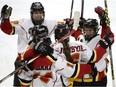 The Calgary Inferno celebrate Rebecca Johnston's empty-net goal against Les Canadiennes de Montreal in the Canadian Women's Hockey League final of the Clarkson Cup in Ottawa on March 13, 2016. (File)