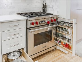 Small spaces can be used in unusual ways, such as this spice rack tucked beside the stove. For Condo Xtra magazine.