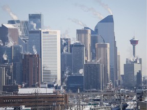 Steam rises from buildings in Calgary, Alta., Wednesday, Feb. 8, 2017. New census data shows the population of the metropolitan area of Calgary outpaced the national growth rate over the last five years.