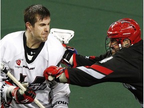 The game came to an end with a tussle between Vancouver Stealth defenceman Matt Beers and Calgary Roughnecks forward Wesley Berg in Vancouver's 13-10 win at the Scotiabank Saddledome in Calgary, on Feb. 18, 2017. (Ryan McLeod)