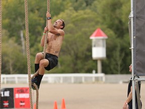 Josh Stryde on the rope climb at the 2016 X Warrior Challenge obstacle race in Calgary.