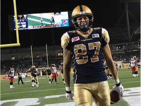 Ex-Winnipeg Blue Bombers receiver Rory Kohlert, seen here celebrating a touchdown catch against the Calgary Stampeders at Investors Group Field in Winnipeg on Sept. 25, 2015, signed with the Stamps in free agency Thursday. (File)