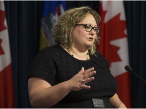 Deputy Premier Sarah Hoffman speaks to the media about the governments latest release of salary details at the Alberta Legislature, in Edmonton Alta. on Thursday June 30, 2016. Photo by David Bloom