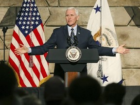 Vice President Mike Pence speaks during a visit to Foster Supply Inc. on Saturday, March 25, 2017, in Scott Depot, W.Va. Pence was in West Virginia to participate in a listening session with small business and job creators in the community. (Sholten Singer/The Herald-Dispatch via AP)