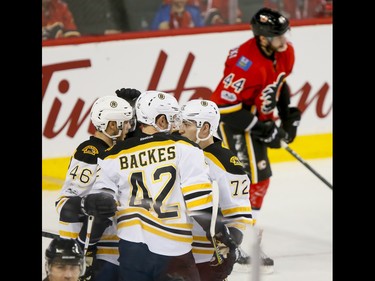 during NHL action in Calgary, Alta., on Wednesday, March 15, 2017. Boston won 5-2, snapping a 10-game Flames winning streak. Lyle Aspinall/Postmedia Network