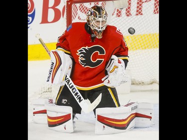 during NHL action in Calgary, Alta., on Wednesday, March 15, 2017. Boston won 5-2, snapping a 10-game Flames winning streak. Lyle Aspinall/Postmedia Network