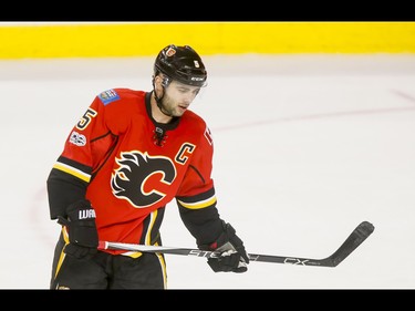 during NHL action in Calgary, Alta., on Wednesday, March 15, 2017. Boston won 5-2, snapping a 10-game Flames winning streak. Lyle Aspinall/Postmedia Network