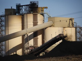 A conveyor belt transports coal at the Westmoreland Coal Company's Sheerness Mine near Hanna, Alta., Tuesday, Dec. 13, 2016.THE CANADIAN PRESS/Jeff McIntosh ORG XMIT: JMC415