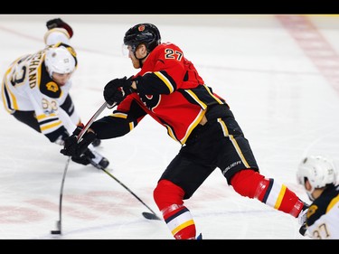 Calgary Flames Dougie Hamilton scores on Boston Bruins goalie Anton Khudobin during NHL hockey in Calgary, Alta., on Wednesday, March 15, 2017. AL CHAREST/POSTMEDIA