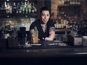 Bartender Nathan Newman of The Derrick Gin Mill and Kitchen makes the Fracking Good #2 cocktail.