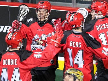 The Calgary Roughnecks celebrate scoring on the Georgia Swarm during National Lacrosse League action at the Scotiabank Saddledome in Calgary on Saturday March 4, 2017.