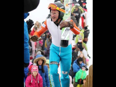 Eddie the Eagle is cheered by fans as he climbs up to ski jump at Canada Olympic Park on Saturday March 5, 2017. The 1988 Olympian was in Calgary ski jumping in support of local jumpers. About a 1000 fans watched the 1988 Olympian jump.