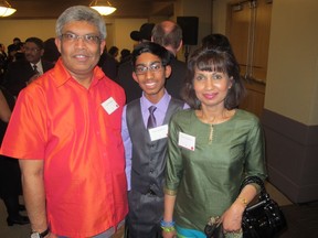 Cal 0325 Immigrant 10 Pictured, from left, at Immigrant Services Calgary's 21st Annual Immigrants of Distinction Awards (IDA) 2017 held Mar 10 at the Westin are U of C professor and 2016 award recipient in the Science, Technology, Engineering and Math category   Janaka Ruwanpura with his son Seniru and wife Senani.