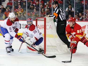 The Calgary Flames'  Sam Bennett comes around behind Montreal Canadiens goaltender Al Montoya during NHL action at the Scotiabank Saddledome on Thursday March 9, 2017.
GAVIN YOUNG/POSTMEDIA NETWORK