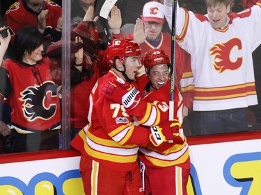 Calgary Flames Micheal Ferland and Johnnie  Gaudreau celebrate Ferland's goal on Montreal Canadiens goaltender Al Montoya during NHL action at the Scotiabank Saddledome on Thursday March 9, 2017.
GAVIN YOUNG/POSTMEDIA NETWORK