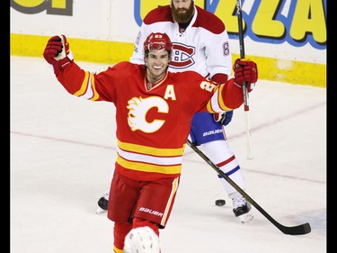 The Calgary Flames' Sean Monahan celebrates scoring on Montreal Canadiens goaltender Al Montoya during NHL action at the Scotiabank Saddledome on Thursday March 9, 2017.
GAVIN YOUNG/POSTMEDIA NETWORK