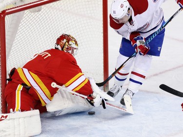 Calgary Flames goaltender Brian Elliott stops this scoring chance by the Montreal Canadiens' Brendan Gallagher during NHL action at the Scotiabank Saddledome on Thursday March 9, 2017.
GAVIN YOUNG/POSTMEDIA NETWORK