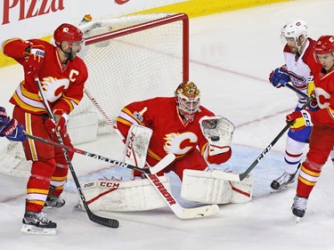 Calgary Flames goaltender Brian Elliott stops this scoring chance by the Montreal Canadiens during second period NHL action at the Scotiabank Saddledome on Thursday March 9, 2017.
GAVIN YOUNG/POSTMEDIA NETWORK