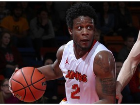 U of C Dinos guard Thomas Cooper drives to the hoop in Canada West playoff action. The Dinos will compete at the national championships starting Thursday.