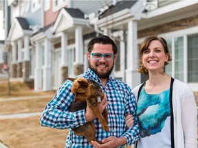 Adam and Christina Carpenter (and Widget) at their new Carnaby Heights Townhome in Nolan Hill.