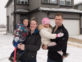 Shannon and Chris Cederstrand, with their children Carter, 2, and Kasey, 5, at their new Baywest home at Ranchers' Rise in Okotoks.