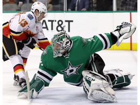 Kari Lehtonen of the Dallas Stars makes a save against Johnny Gaudreau of the Calgary Flames at American Airlines Center on Dec. 6, 2016, in Dallas. (Getty Images)