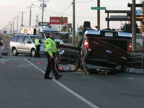 A fatal car crash in the SE on 52 Street and Erin Woods Drive has Calgary Police investigating the scene on September 20, 2013.