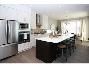 The kitchen in the Macleod show home by Cedarglen Homes in Livingston.