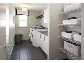 The Linea floor plan by Hopewell Residential shows a walk-through laundry room in the show home in Mahogany.