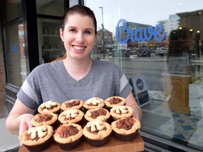 Crave Kensington cupcake server Alicia Lewis share some 3.14 goodness in a little pecan pie leading up to the March 14 Pi Day in Calgary, Alta., on March 13, 2017. Ryan McLeod/Postmedia Network