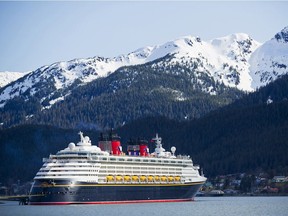 The Disney Wonder cruise ship sails to Juneau as part of its Alaska itinerary. Surrounded by snow-capped mountains, sweeping glaciers and rainforests, the state capital of Alaska is a scenic wonderland. (Matt Stroshane, photographer)