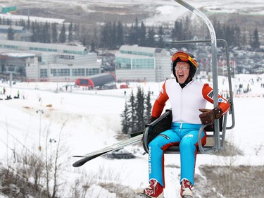 Michael Edwards best known as Eddie the Eagle rides a chair for another jump in Calgary. The 1988 Olympian was ski jumping in support of local jumpers at Canada Olympic Park on Saturday March 5, 2017. About a 1000 fans watched Eddie jump.  GAVIN YOUNG/POSTMEDIA NETWORK